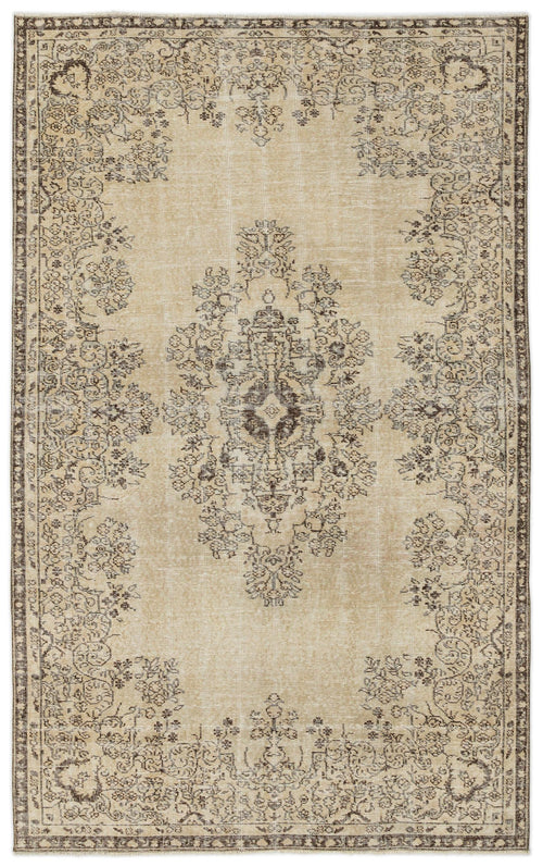 Load image 1 in gallery view. The Preutata Vintage Medallion Rug (5'4" x 8'11") features a faded beige background with an intricate central medallion and ornate brown and gray floral patterns, all framed by a decorative border for true vintage charm.