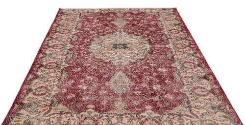 Load image 1 in gallery view. Distressed deep red Persian-style rug with a central floral medallion and intricate cream and charcoal botanical patterns.
