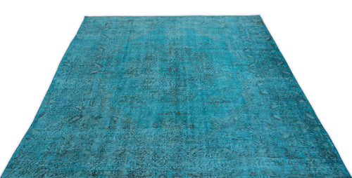 Load image 1 in gallery view. Teal distressed area rug with a faded traditional medallion pattern on a white background.