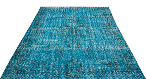 Load image 1 in gallery view. Bright turquoise distressed area rug with a faded traditional medallion pattern on a white background.
