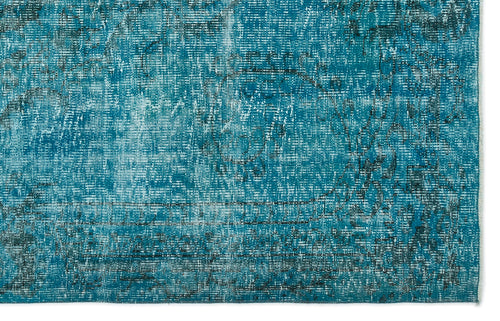 Load image 1 in gallery view. Teal and black distressed rug with a faded traditional medallion pattern.