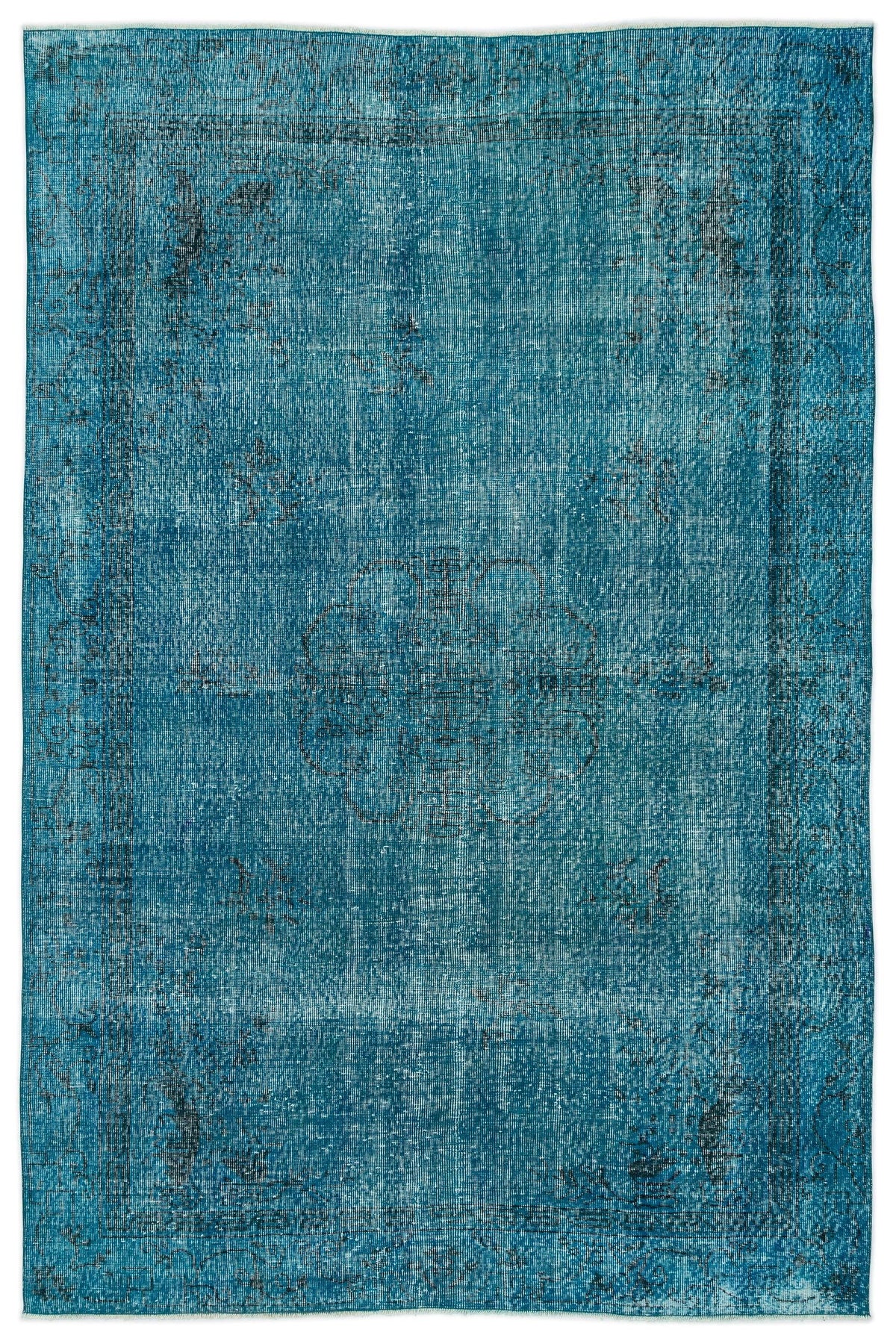 Teal distressed area rug with a faded central medallion and traditional border pattern on a white background.