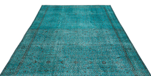 Load image 1 in gallery view. Teal and black distressed vintage-style rug with a traditional ornate border and faded central medallion pattern.