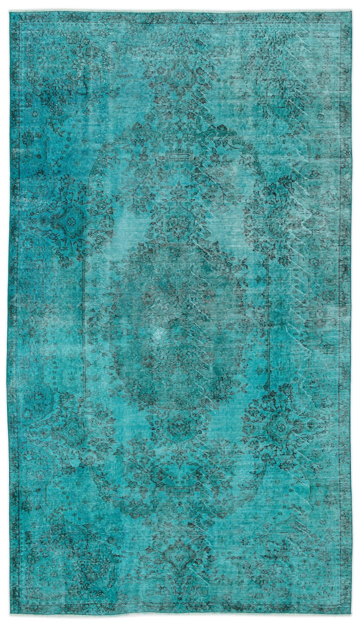 Teal distressed area rug with a faded black traditional floral medallion pattern.