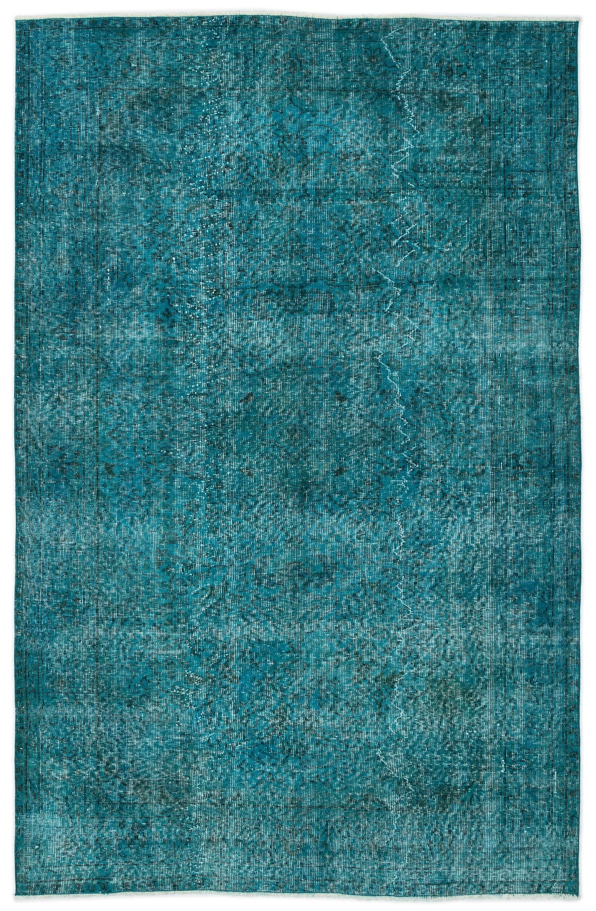 Teal distressed area rug with a faded traditional medallion pattern and a white fringed edge.
