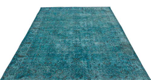 Load image 1 in gallery view. Teal and charcoal distressed rug with a traditional floral medallion pattern on a white background.