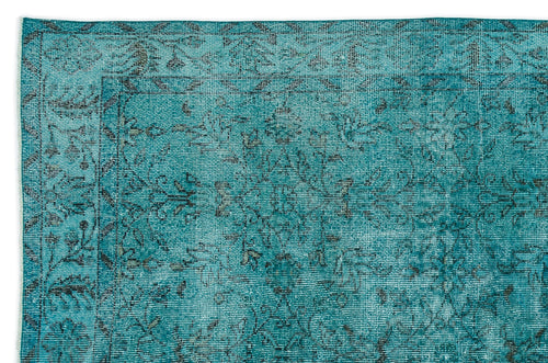 Load image 1 in gallery view. Teal and black distressed rug with a traditional floral medallion pattern and a bordered edge.