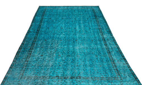 Load image 1 in gallery view. Turquoise and black distressed rug with a traditional ornate medallion pattern on a white background.