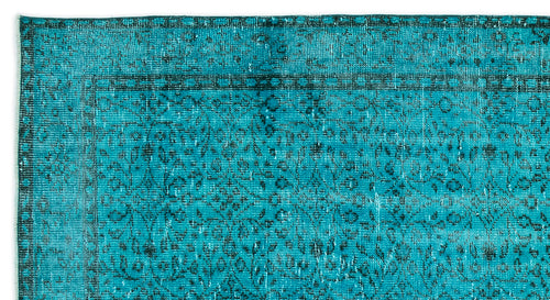 Load image 1 in gallery view. Teal and black distressed rug with a traditional floral medallion pattern and a geometric border.