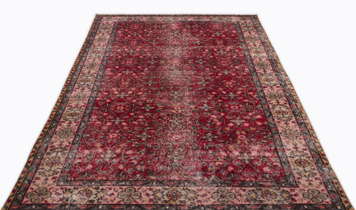 Load image 1 in gallery view. Deep red traditional rug with a distressed floral medallion pattern and a multi-colored border on a white background.