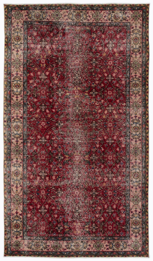 Load image 1 in gallery view. Distressed red Persian-style rug with a floral vine pattern and a wide, multi-colored decorative border.