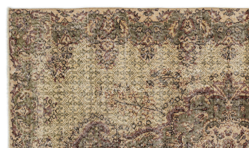 Load image 1 in gallery view. Distressed vintage-style rug with a faded floral medallion pattern in olive green, deep red, and beige.