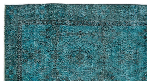 Load image 1 in gallery view. Teal and black distressed rug with a traditional medallion pattern and a wide decorative border.