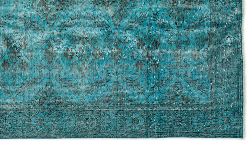 Load image 1 in gallery view. Teal and black distressed rug with a traditional floral medallion pattern and a bordered edge.