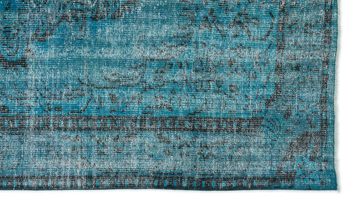 Load image 1 in gallery view. Teal and black distressed rug with a traditional ornate medallion pattern and a bordered edge.