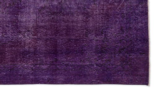 Load image 1 in gallery view. Deep purple distressed rug with a faint, traditional overdyed medallion pattern and a thin border.
