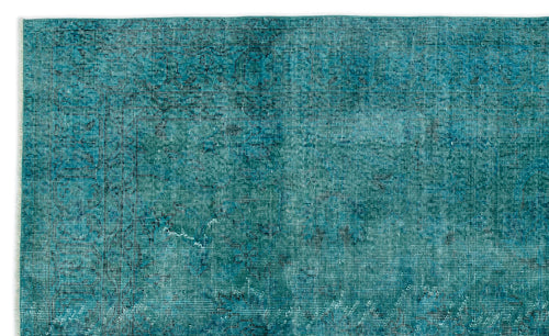 Load image 1 in gallery view. Teal and dark blue distressed rug with a faded, overdyed traditional pattern.