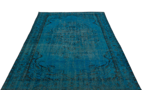 Load image 1 in gallery view. Teal and black distressed traditional rug with a central medallion and ornate border on a white background.