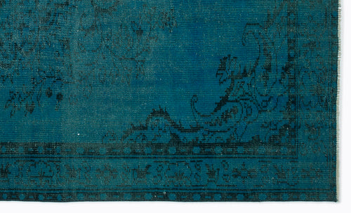 Load image 1 in gallery view. Teal rug with a distressed black traditional floral pattern and a geometric border.