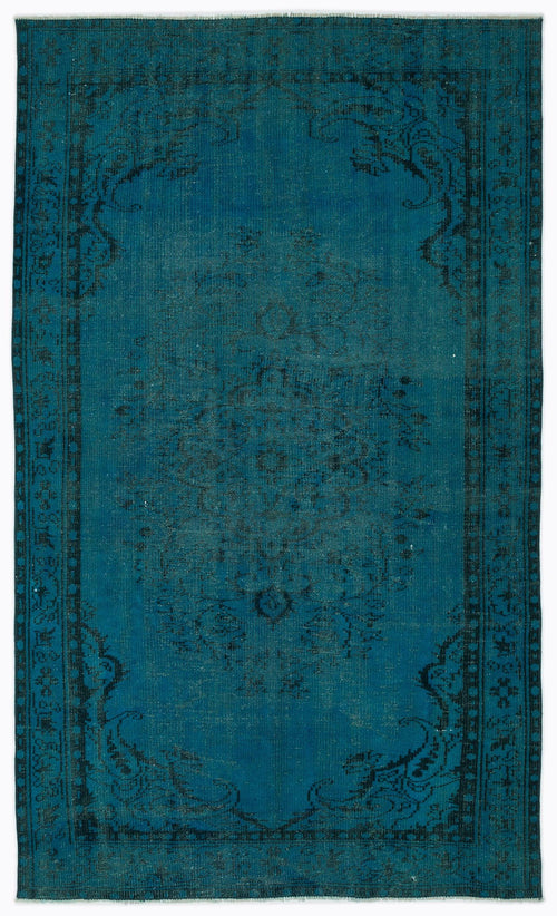 Load image 1 in gallery view. Teal and black distressed rug with a traditional central medallion and ornate border pattern.