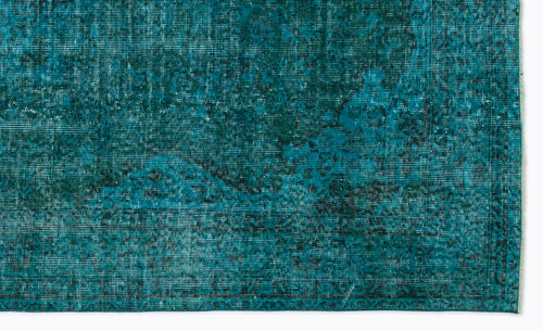Load image 1 in gallery view. Teal and dark green distressed rug with a faded traditional medallion pattern and a bordered edge.