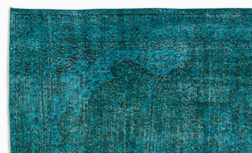 Load image 1 in gallery view. Teal and dark green distressed traditional rug with a faded ornate border and central medallion pattern.