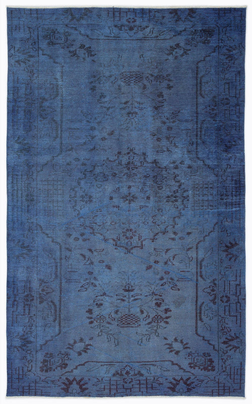 Load image 1 in gallery view. Monochromatic blue vintage-style rug with a faded, distressed traditional floral medallion pattern.