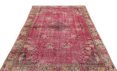 Load image 1 in gallery view. Distressed magenta rug with a central medallion, floral motifs, and a beige border on a white background.