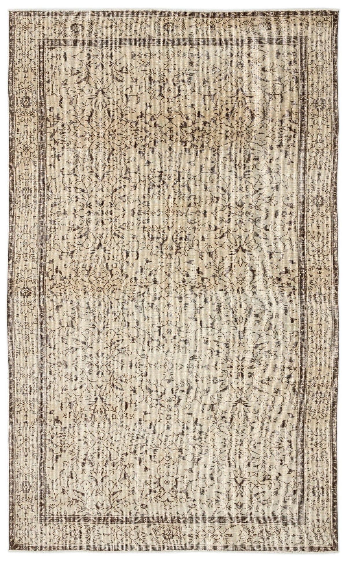 The Trabiane - Vintage Floral Rug (6'1 x 9'11) showcases a rectangular beige and brown design with intricate floral and vine patterns, decorative borders, and a symmetrical, hand-woven style for an elegant traditional look.