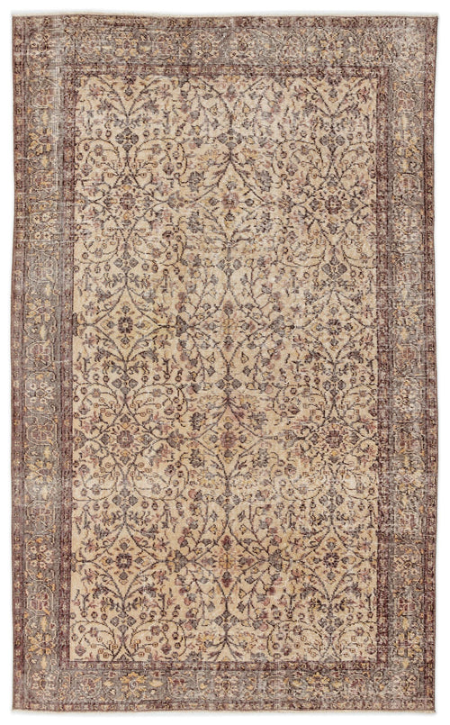 Load image 1 in gallery view. Distressed beige and brown rug with a traditional floral medallion pattern and a wide decorative border.