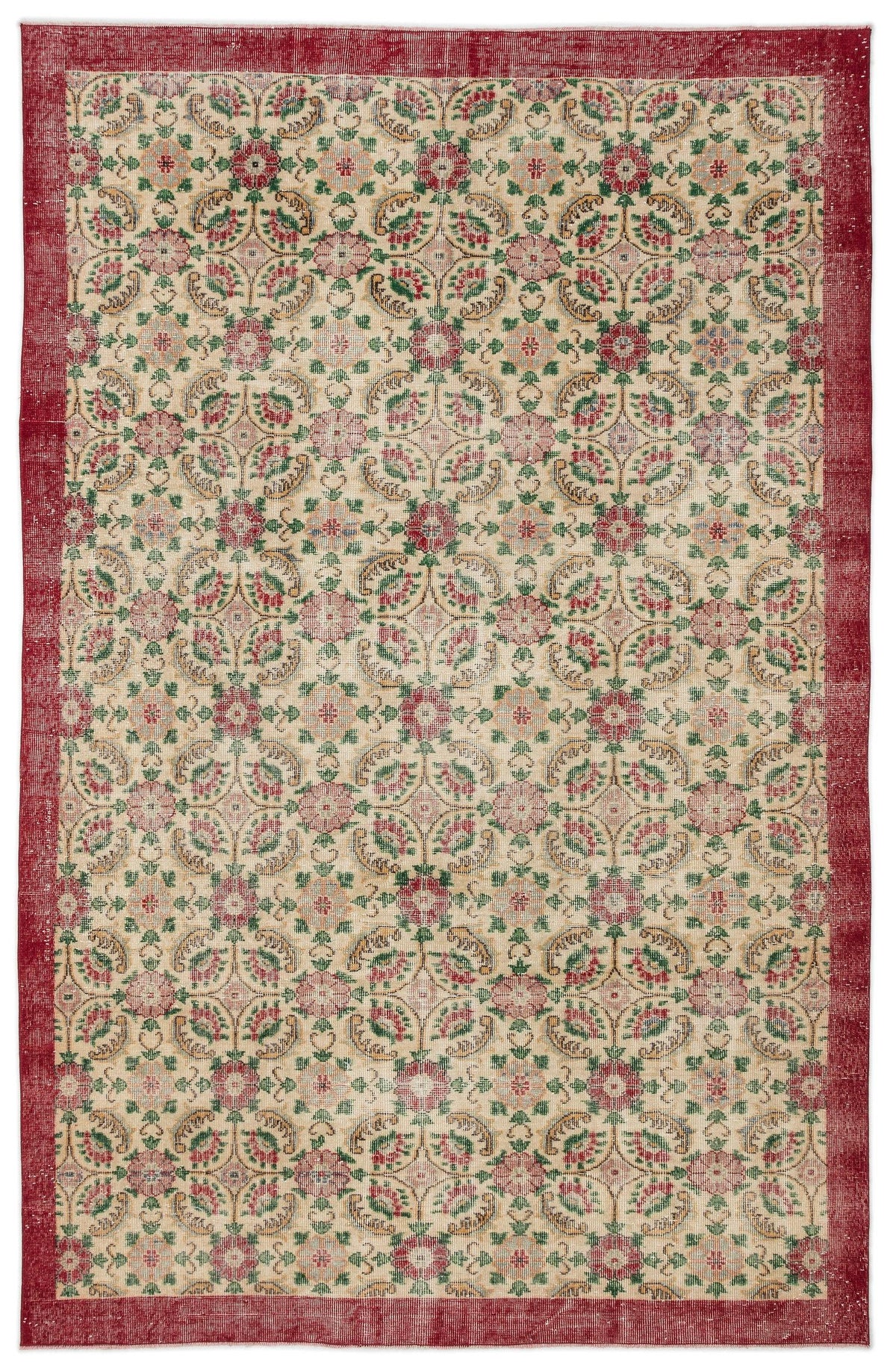 Beige rug with a red border and a repeating floral medallion pattern in red, green, and gold.