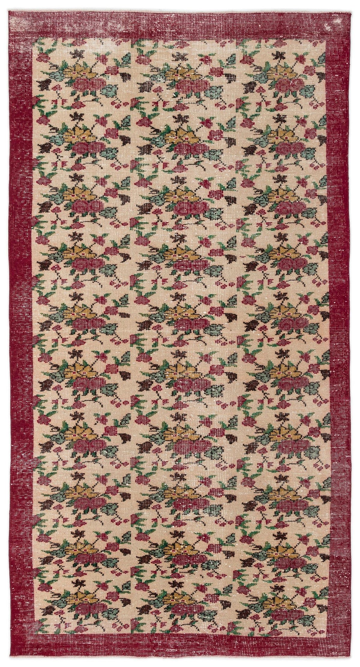 Beige runner rug with a repeating floral pattern in red, yellow, and green, framed by a solid red border.
