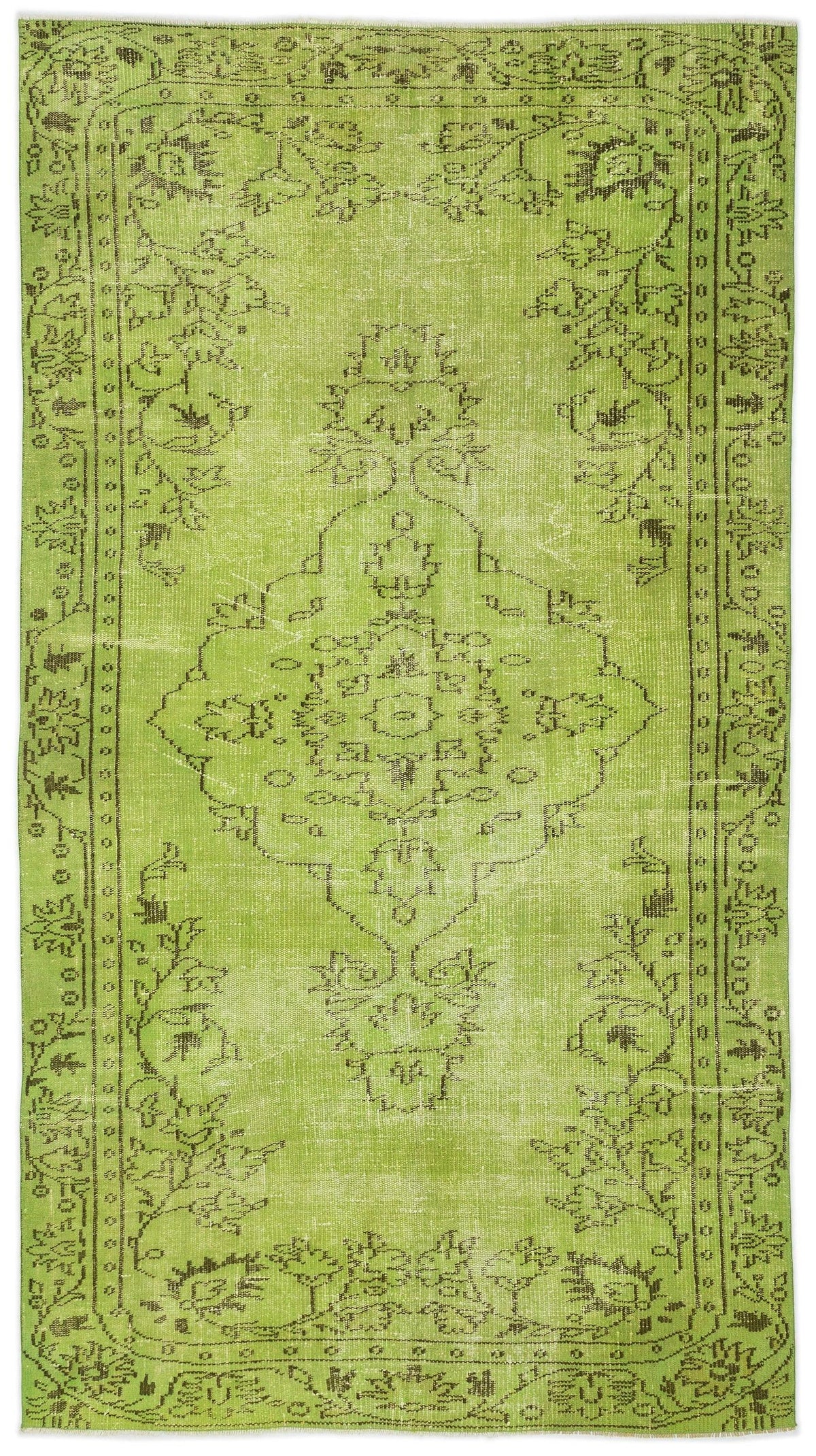 Lime green vintage-style rug with a dark brown distressed floral medallion pattern and a decorative border.