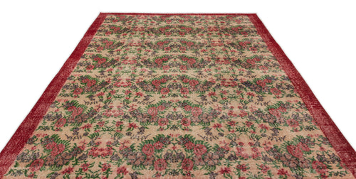 Load image 1 in gallery view. Beige vintage-style rug with a red floral pattern and a wide red border on a white background.