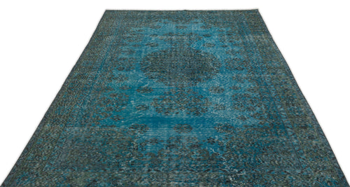Load image 1 in gallery view. Teal and dark grey distressed rug with a traditional central medallion pattern on a white background.