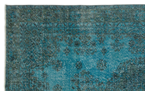 Load image 1 in gallery view. Teal and dark grey distressed rug with a traditional floral medallion pattern and a bordered edge.