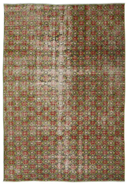 Load image 1 in gallery view. Distressed green and red rug with a repeating geometric floral pattern and a faded central vertical stripe.