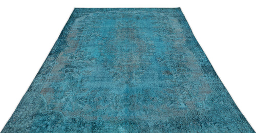 Load image 1 in gallery view. Teal and charcoal distressed traditional rug with a faded central medallion pattern on a white background.