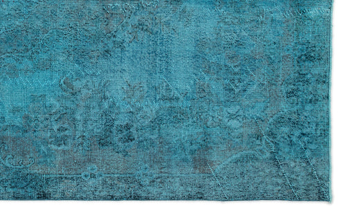 Load image 1 in gallery view. Teal and dark blue distressed rug with a faded, vintage-inspired traditional pattern.