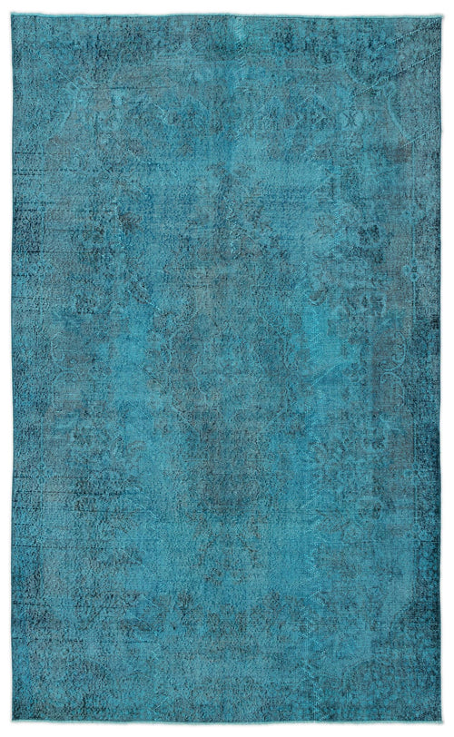 Load image 1 in gallery view. Teal and dark blue distressed rug with a faded traditional medallion pattern on a white background.