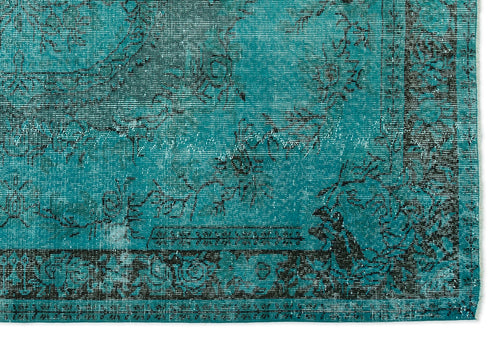 Load image 1 in gallery view. Teal and black rug with a distressed traditional floral medallion pattern and a decorative border.