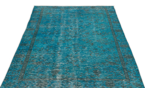 Load image 1 in gallery view. Teal and charcoal distressed area rug with a faded traditional medallion pattern and a bordered edge.