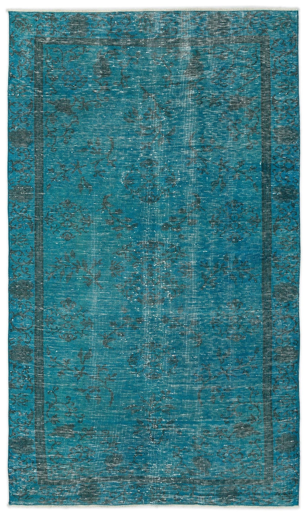 Teal and charcoal distressed rug with a traditional floral medallion pattern and a bordered edge.