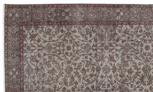 Load image 1 in gallery view. Distressed dark red and grey rug with a traditional floral medallion pattern and a wide decorative border.