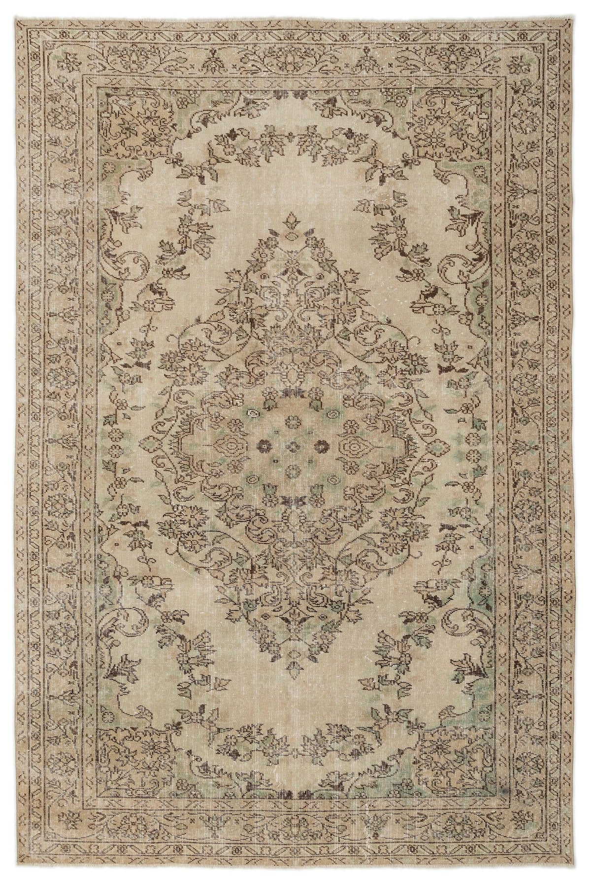 The Mamail Vintage Medallion Rug (6'4 x 9'7) features a rectangular shape, intricate floral medallion design in beige, taupe, and muted green tones, with an ornate border and worn finish that evoke Anatolian heritage and vintage charm.