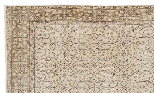 Load image 1 in gallery view. Close-up of the Mofean Vintage Floral Rug (5'2" x 8'7"), featuring a beige and brown Persian-style flatweave with intricate floral and vine patterns and a detailed vintage-inspired border.