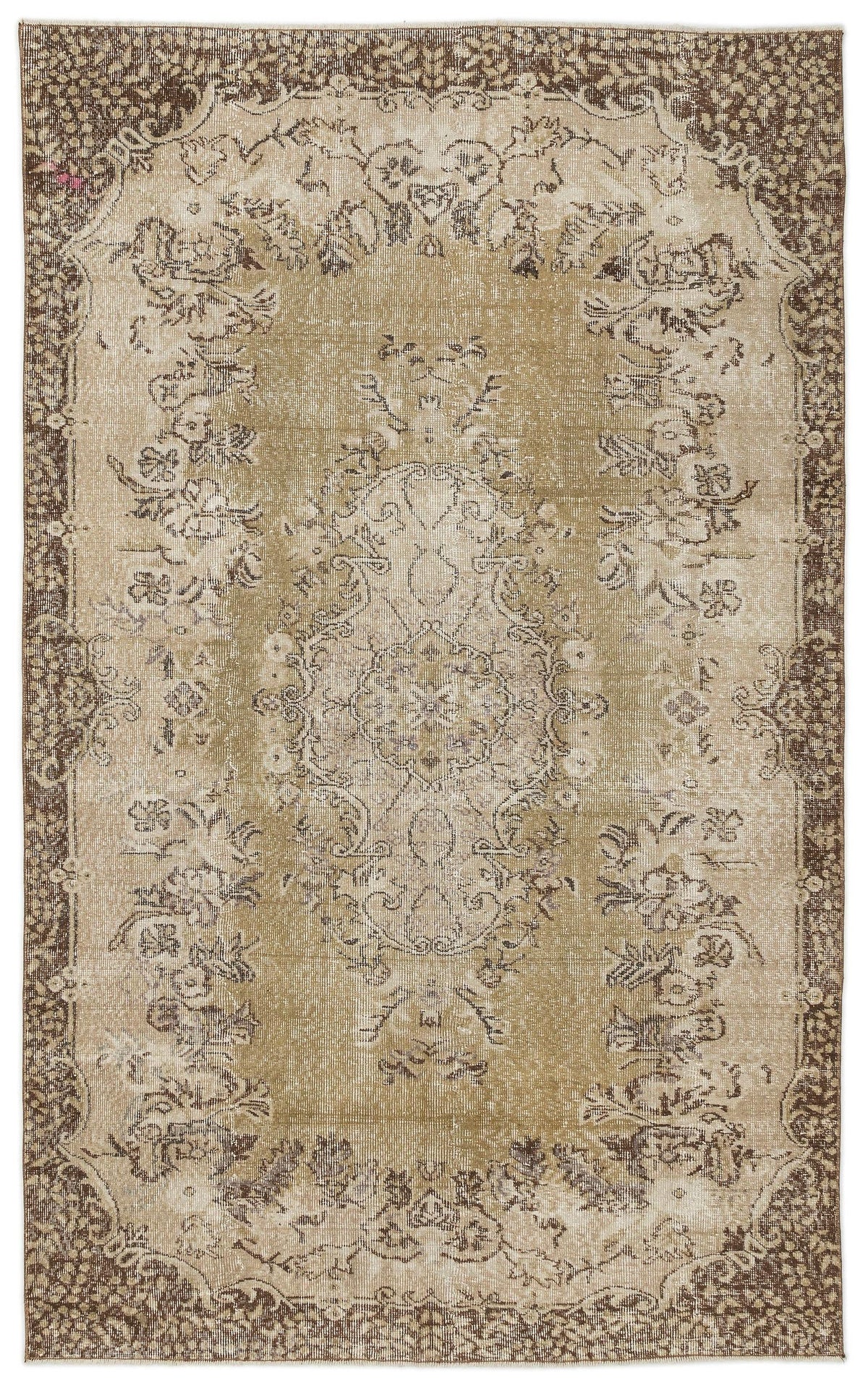 Distressed tan and brown vintage-style rug with a central floral medallion and ornate border pattern.