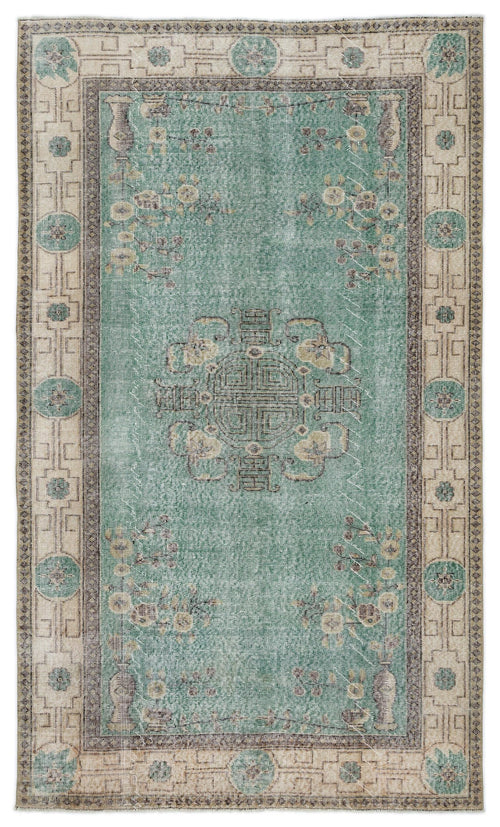 Load image 1 in gallery view. Teal and beige vintage-style rug with a central medallion, floral motifs, and a geometric border.
