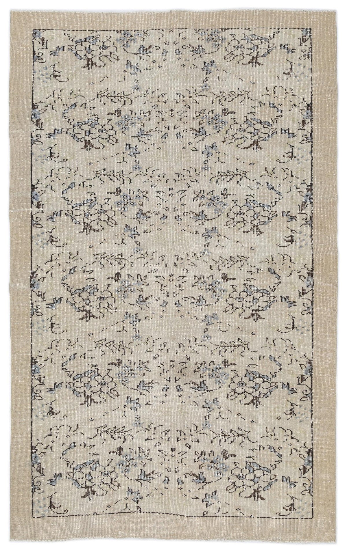 Beige rug with a repeating blue and black floral medallion pattern and a solid border on a white background.