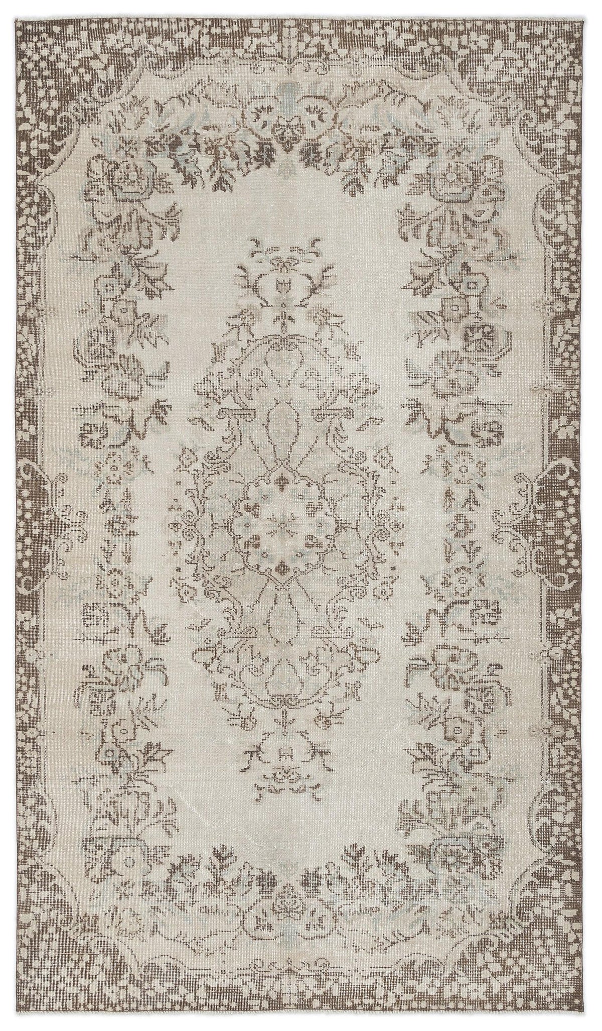 Beige and brown vintage-style rug with a central floral medallion and ornate border on a white background.
